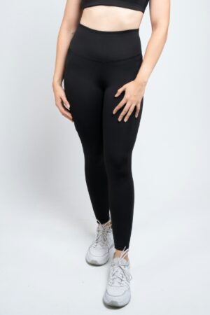 Legging con bolsillos y corte levanta cola